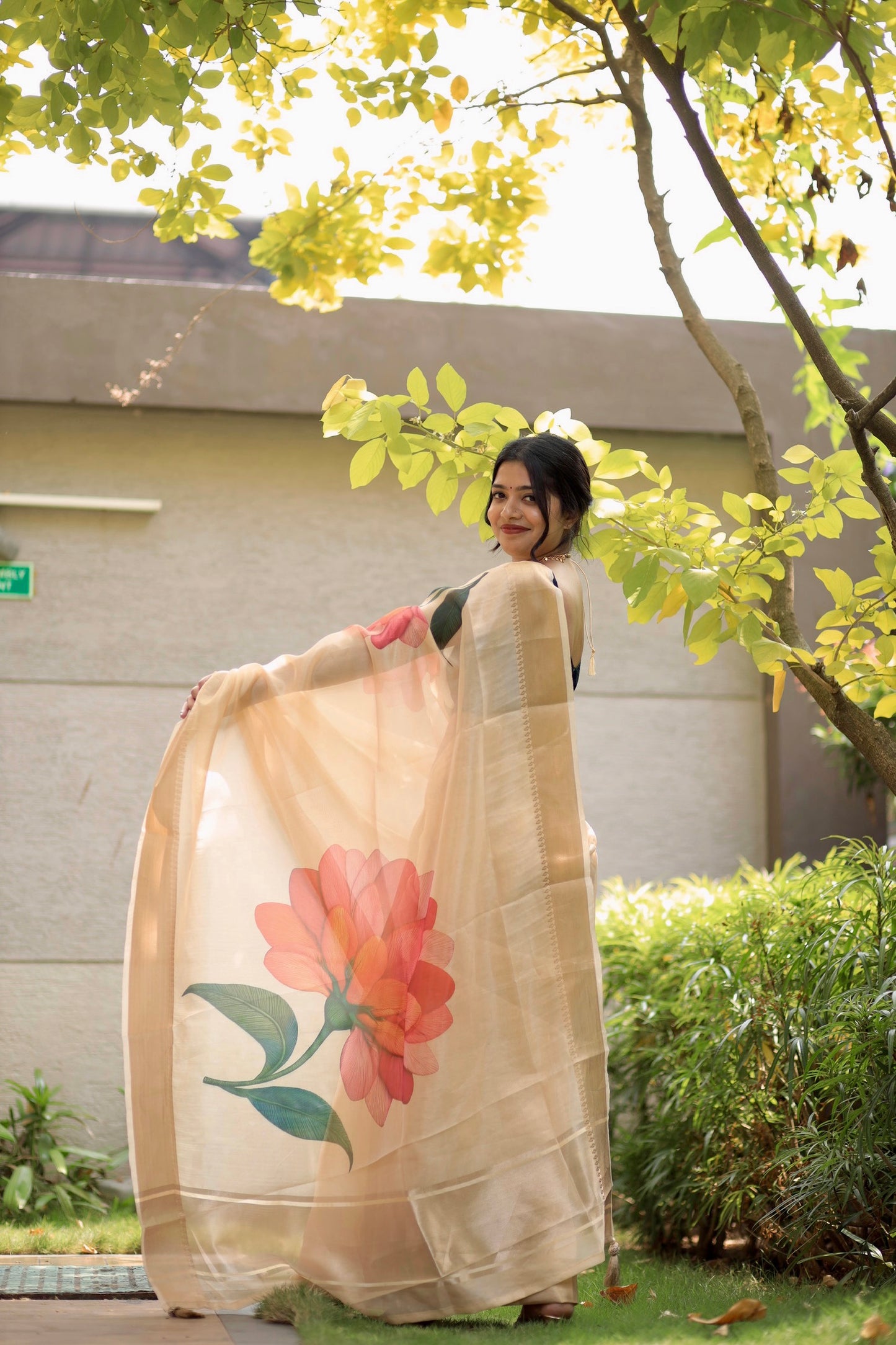 Vishu Special Golden Tissue Saree with Golden Borders & Orange Floral Prints (Blouse Included)