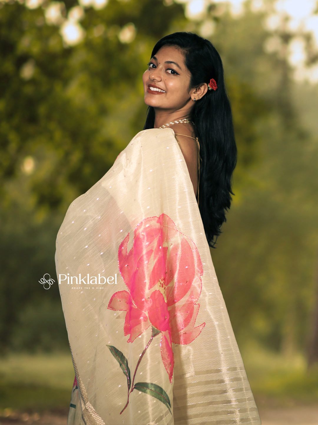 Ivory Tissue Saree with Soft Pink Floral Motifs