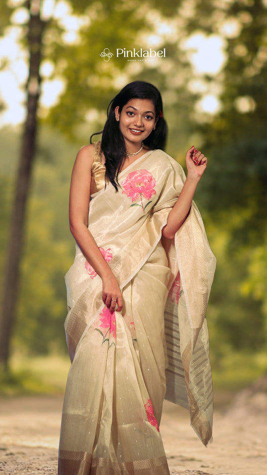 Ivory Tissue Saree with Soft Pink Floral Motifs
